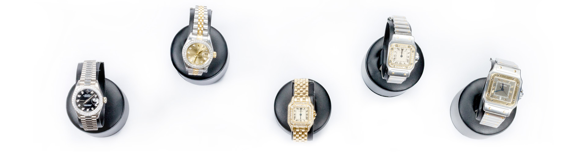 5 hochwertige Uhren, unter anderem der Marke Rolex, mit Diamanten besetzt