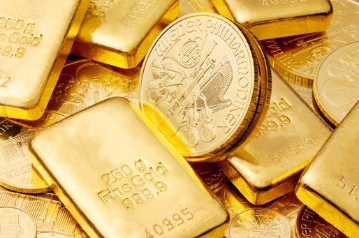 Goldbarren und Goldmünze