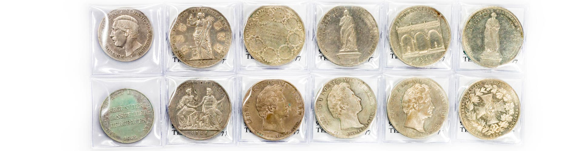 12 historische Sammlermünzen unter anderem Mansfelder Bergbau